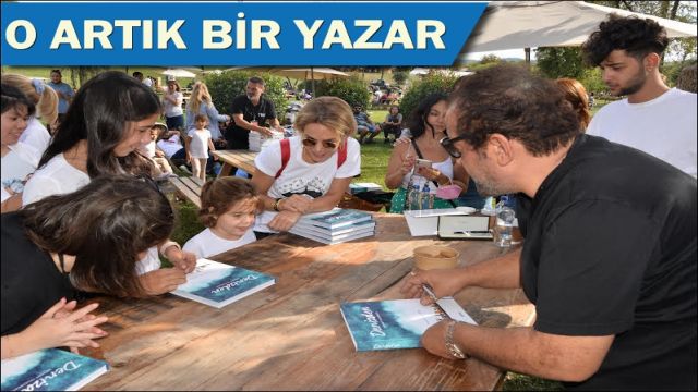 ÖNCE KİTABINI İMZALADI, SONRA YEMEKLERİN TADINA BAKTI